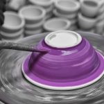 brush glazing a bowl